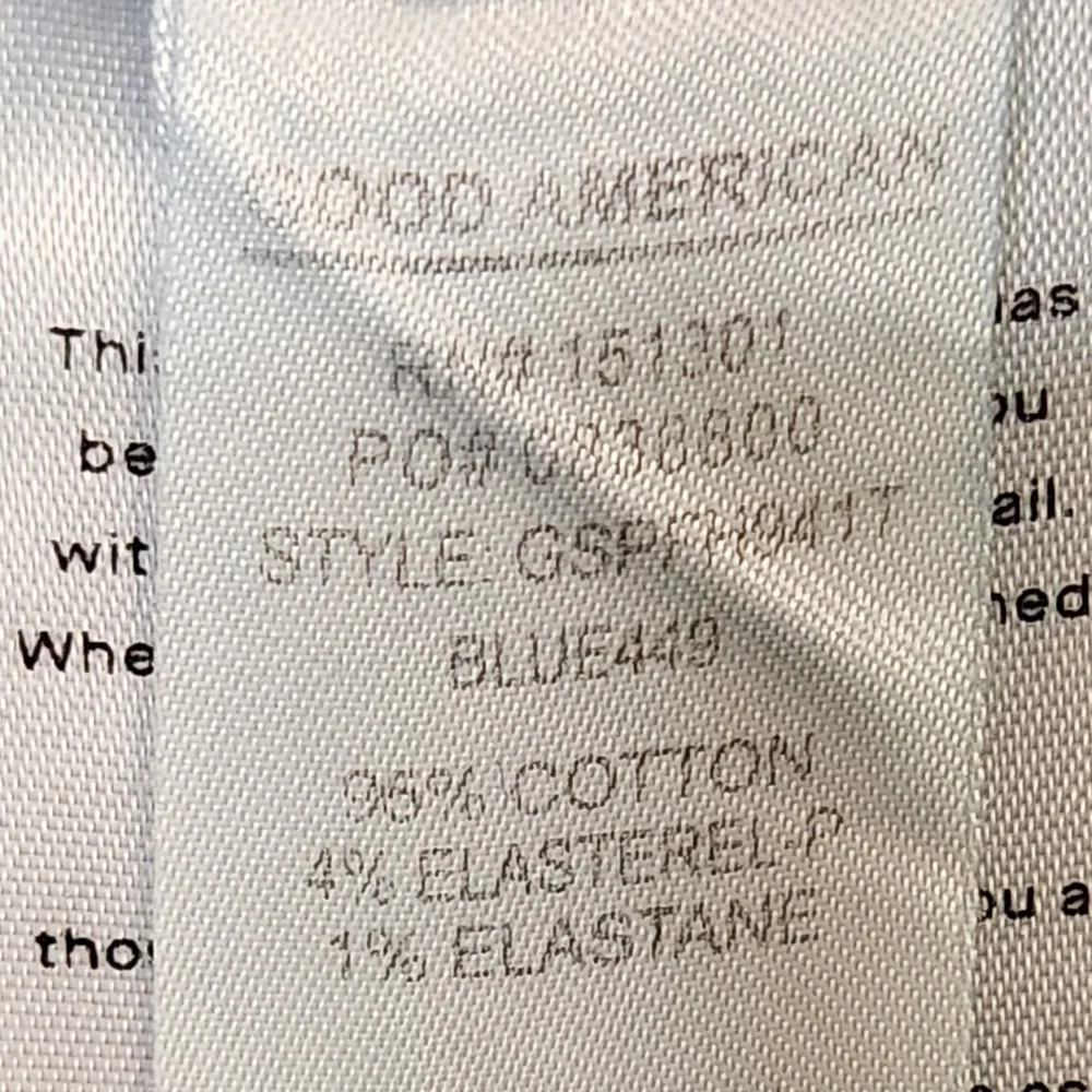 Good American Distressed Raw Hem Jeans 10